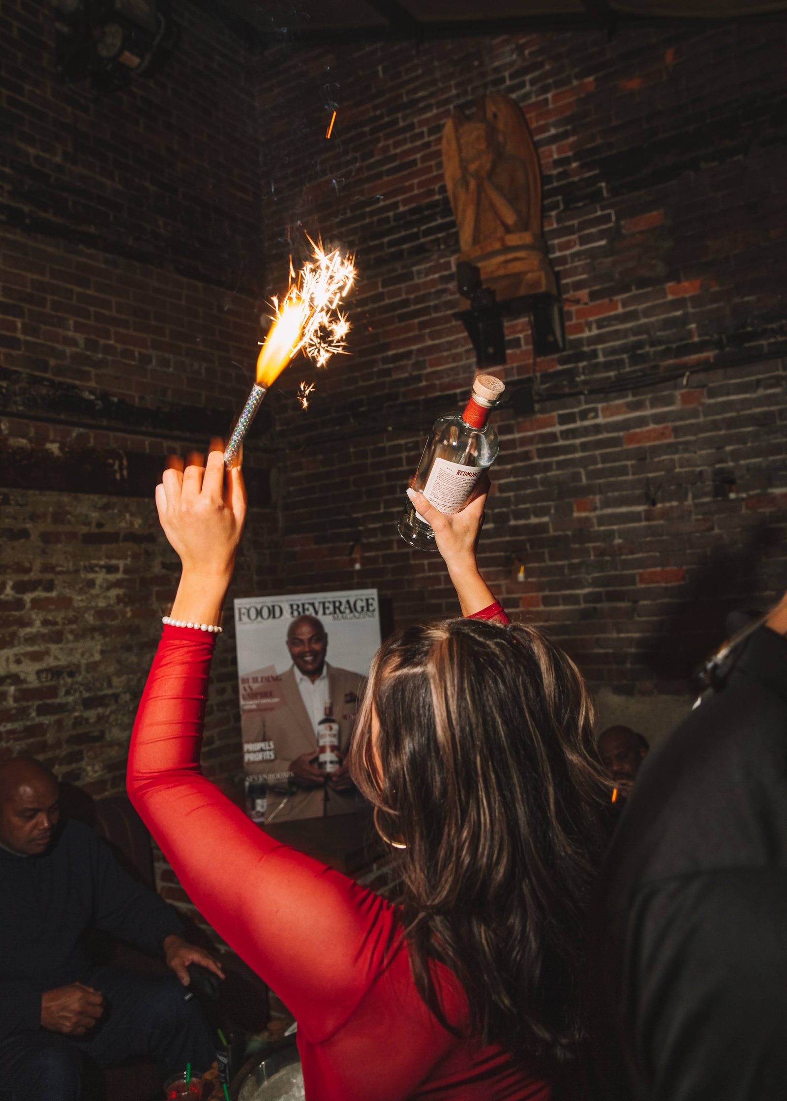 Redmont Vodka bottle service carried through the room with sparklers lit