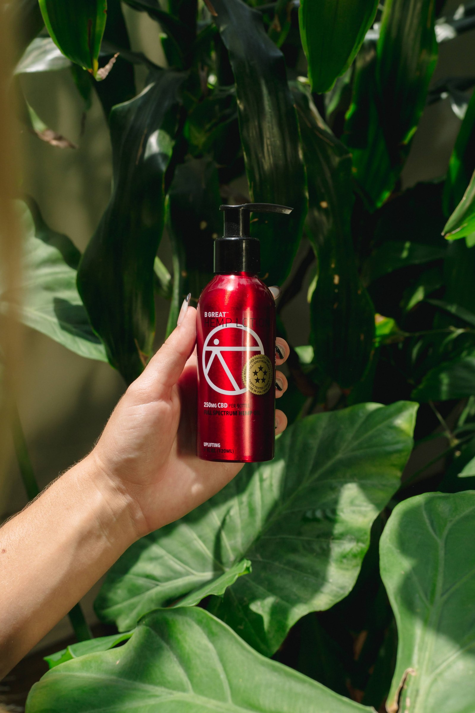 B.Great oil bottle photographed among tropical leaves