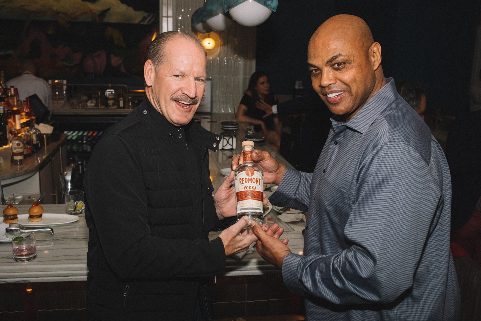 Charles Barkley toasting a Redmont Vodka serve at the launch